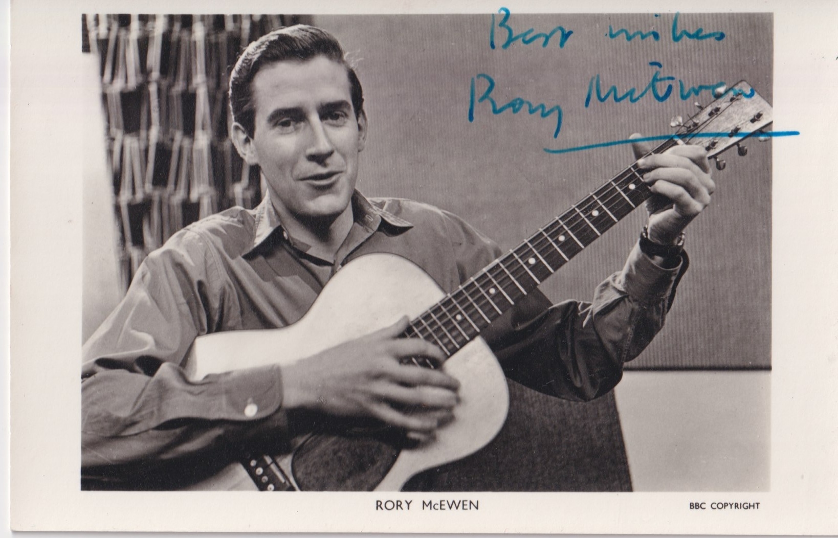 Signed BBC publicity photograph of Rory McEwen playing guitar